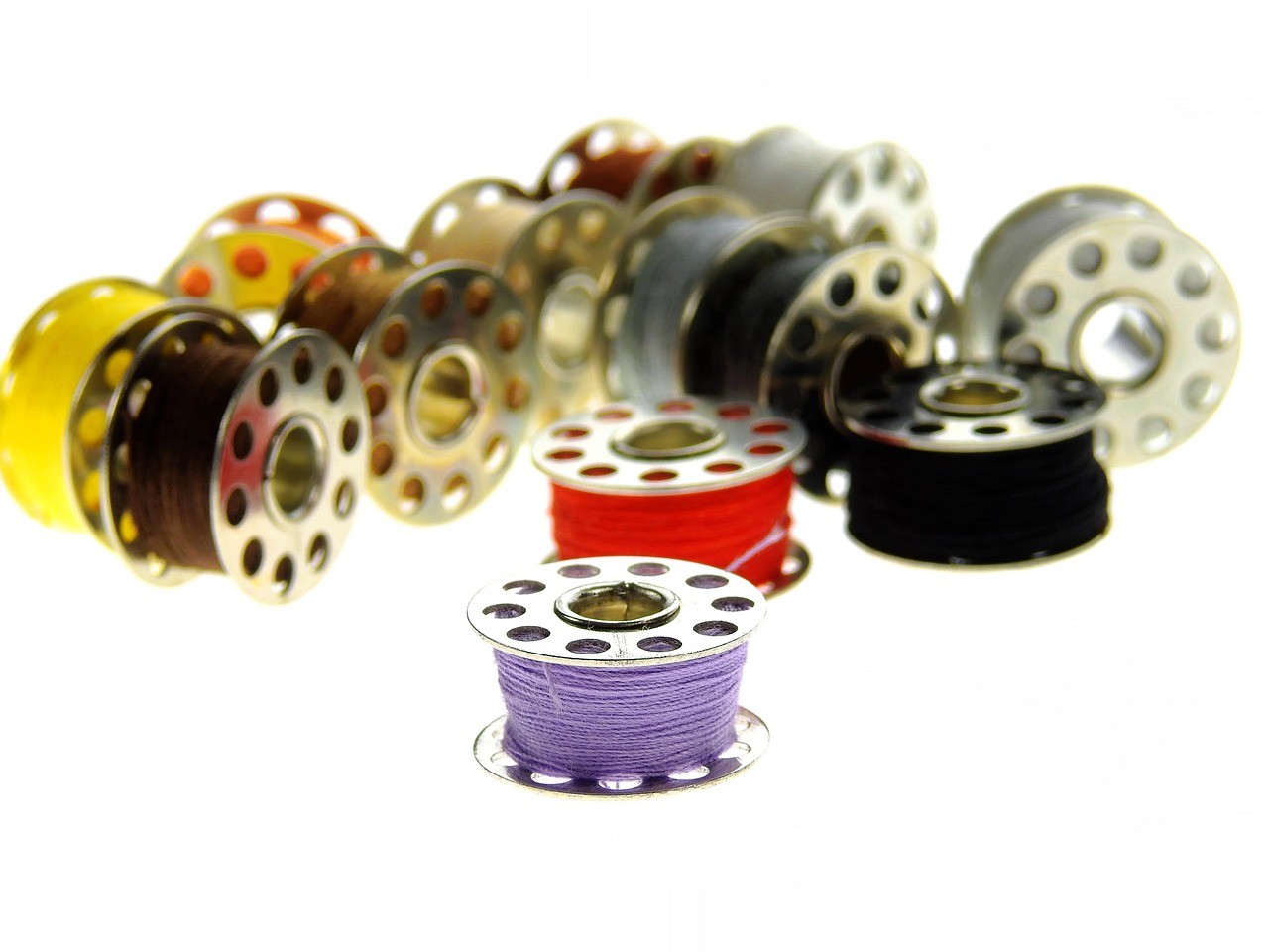 Replacement pod cartridges and coil heads laid out in bulk packaging